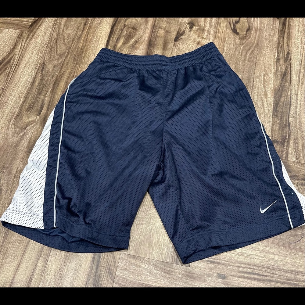 Men’s Nike size large. Navy blue. No issues